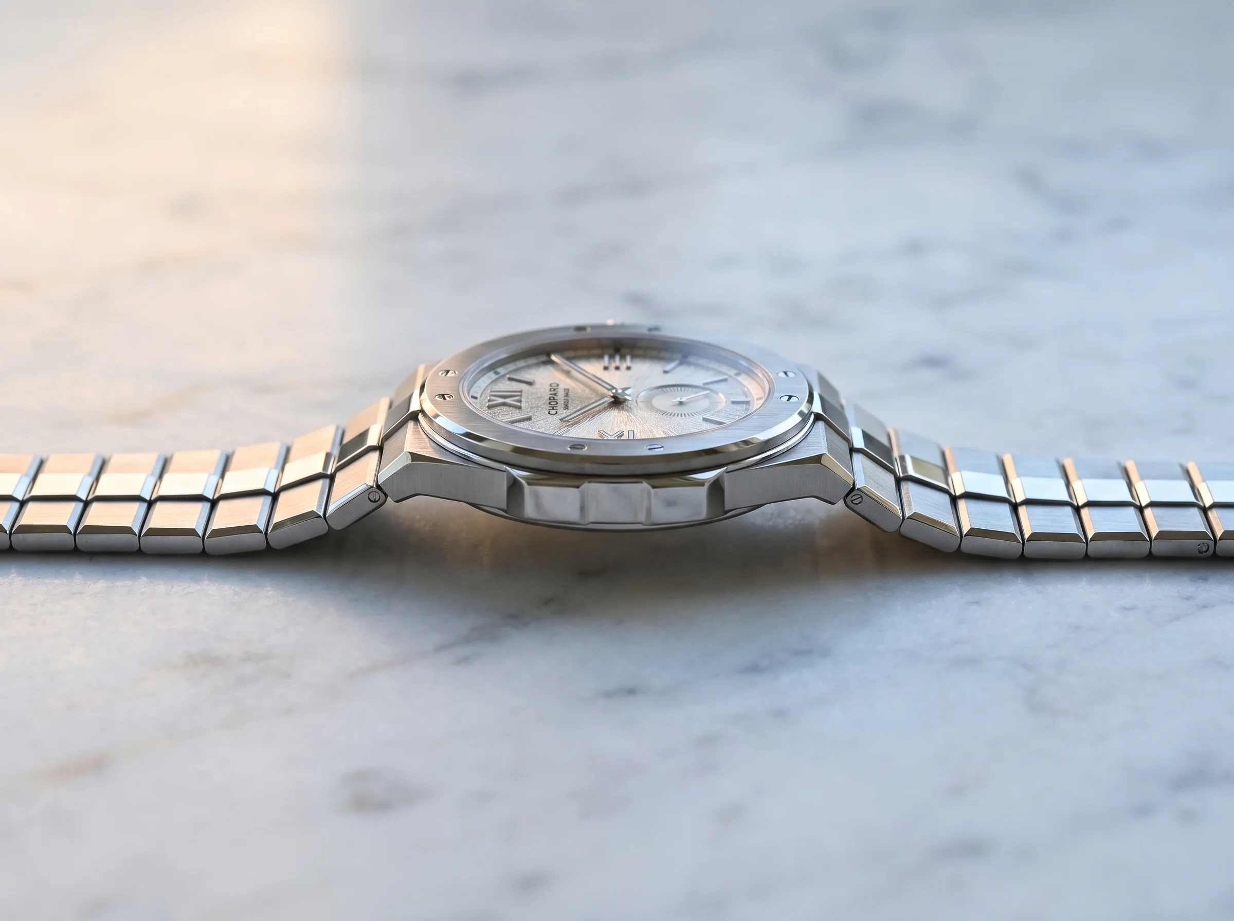 Side profile showing the ultra-thin 8mm case of the Chopard Alpine Eagle 41 XPS on its integrated bracelet