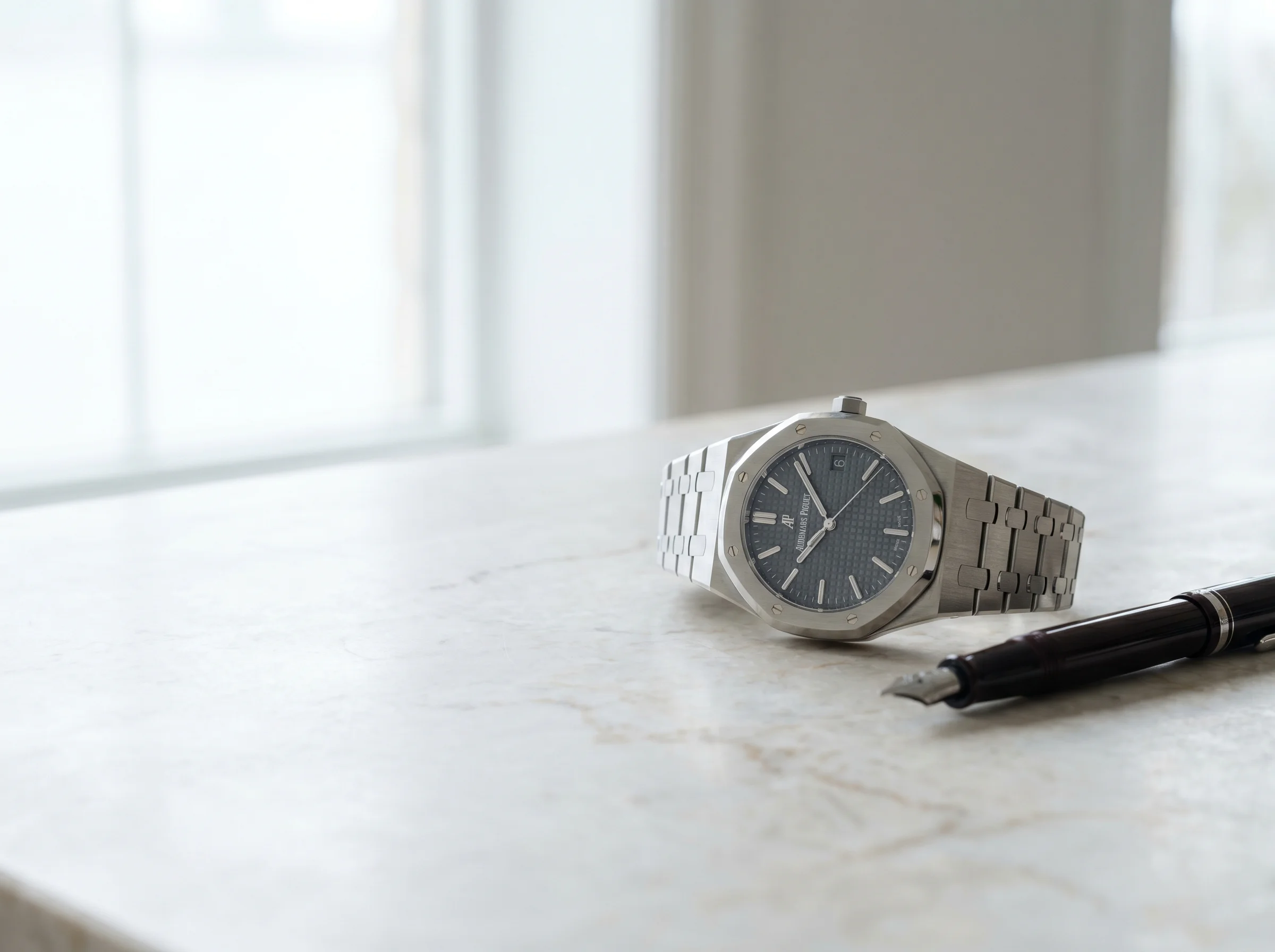 Audemars Piguet Royal Oak 15510ST in steel with slate-grey Grande Tapisserie dial on marble