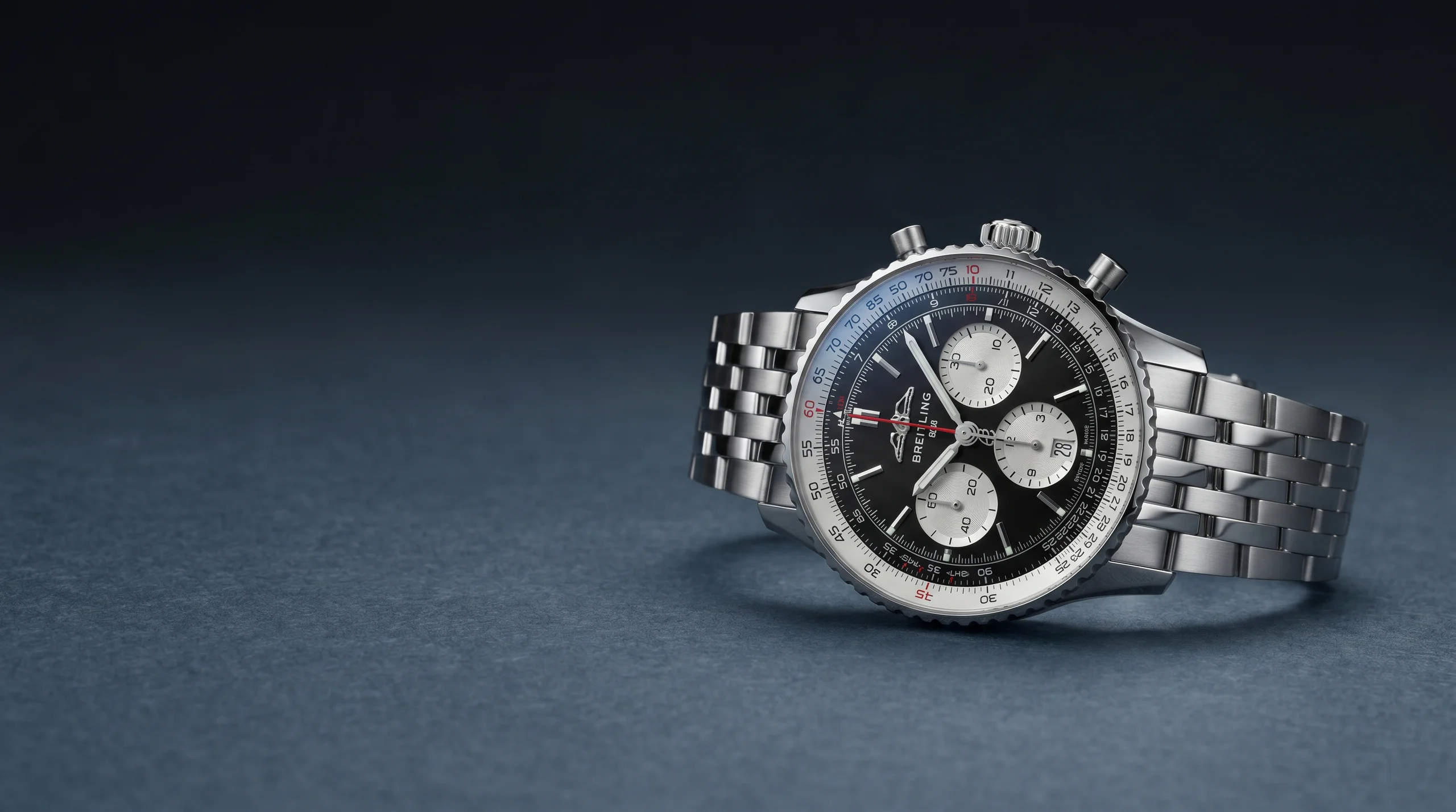 Breitling Navitimer B01 Chronograph 43 reference AB0138 in stainless steel with black dial on the steel beads-of-rice bracelet, the volume reference of the modern Navitimer line