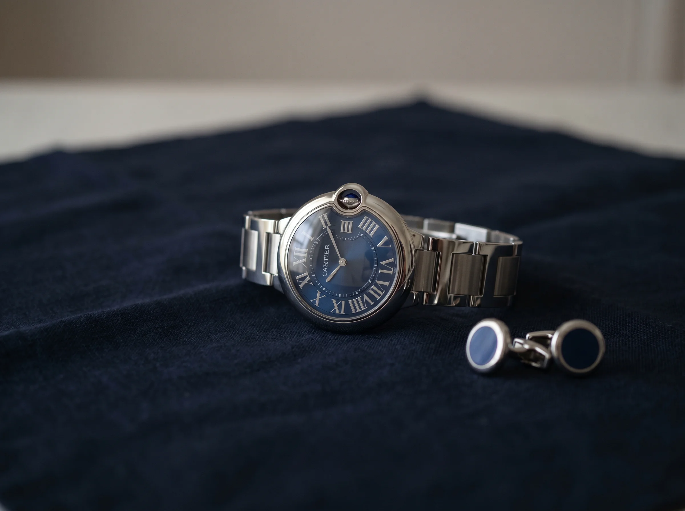 Cartier Ballon Bleu 42mm in steel with deep blue sunray dial on navy linen