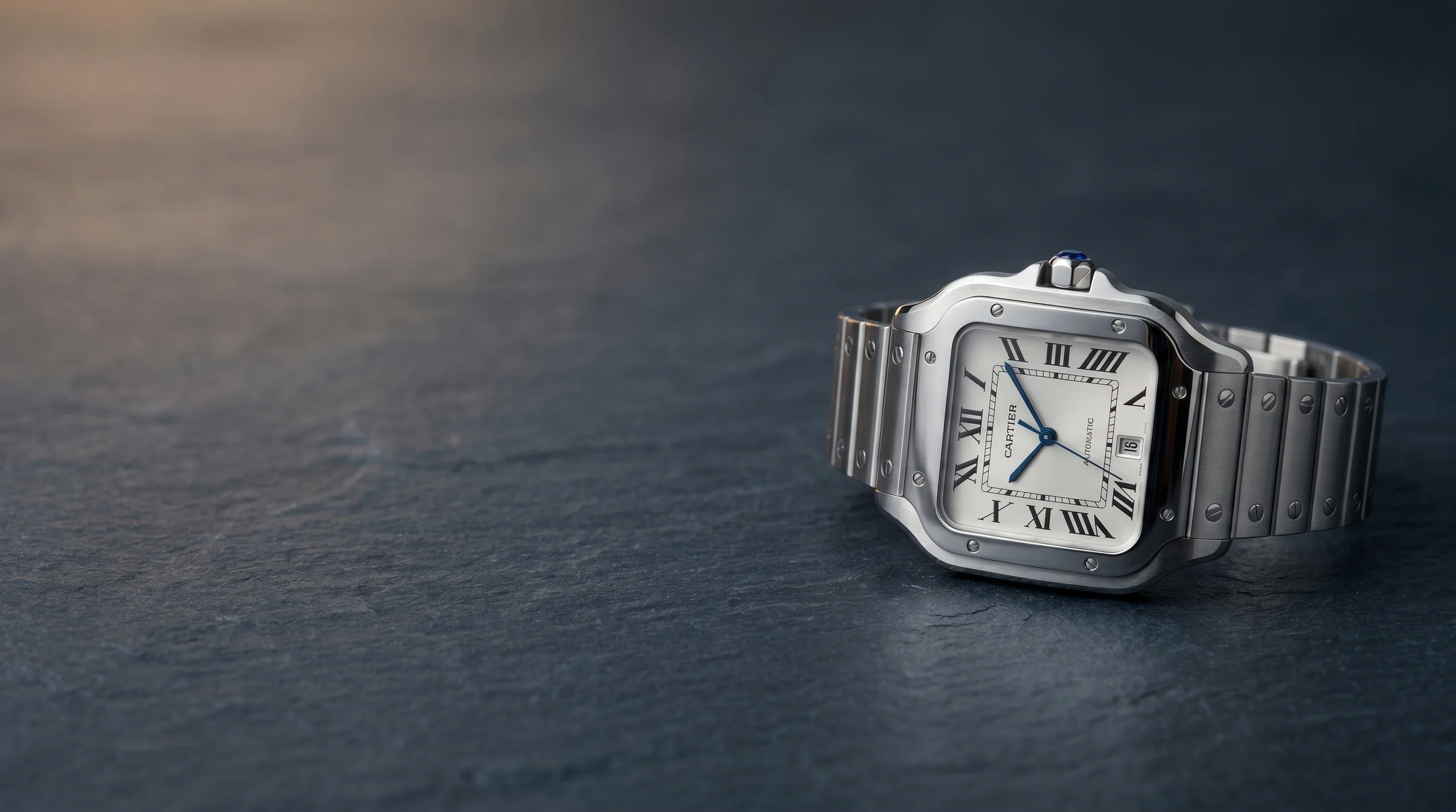 Cartier Santos de Cartier Large WSSA0018 in stainless steel with silver dial, eight visible screws on the bezel and integrated SmartLink steel bracelet