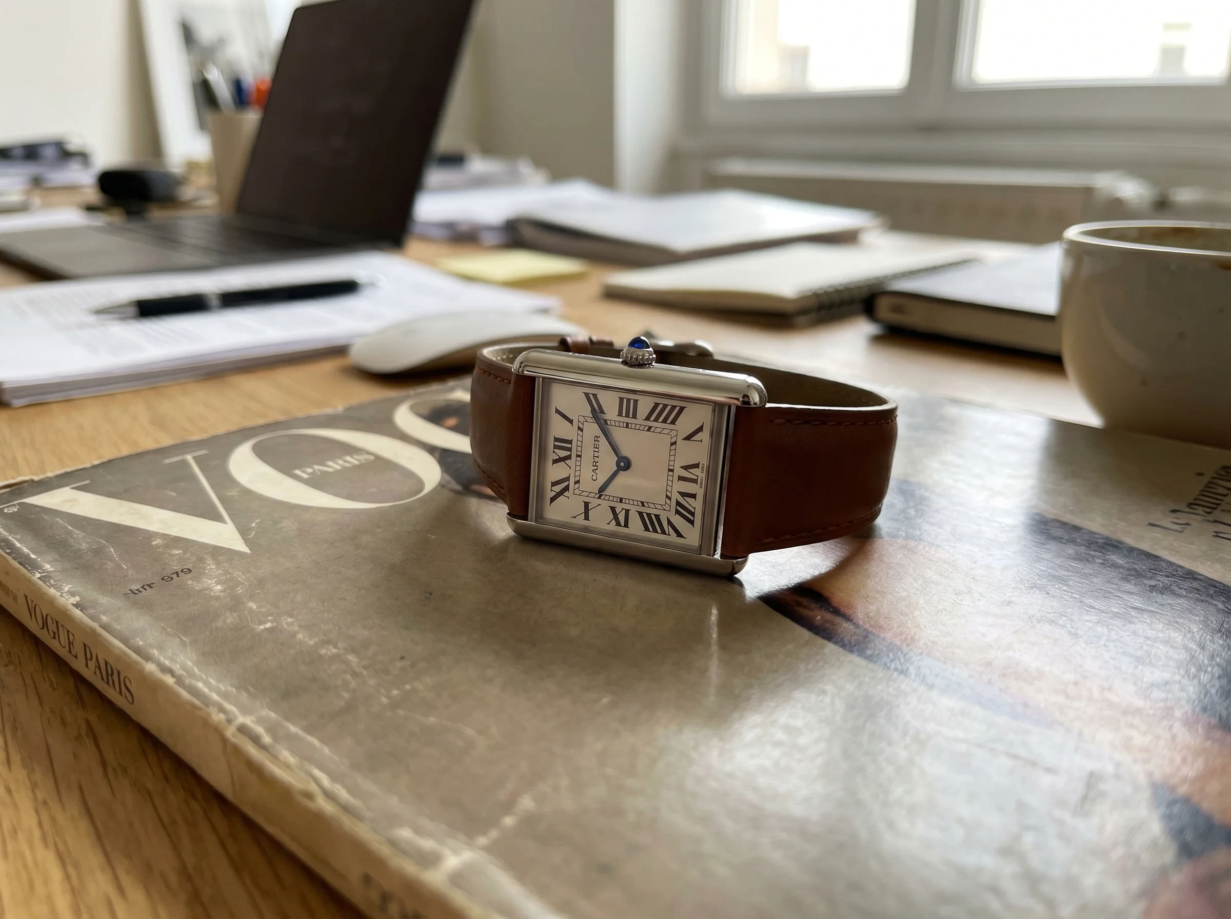 Cartier Tank Must Extra Large WSTA0040 in stainless steel with automatic Manufacture movement, silvered opaline dial, and brown calfskin strap