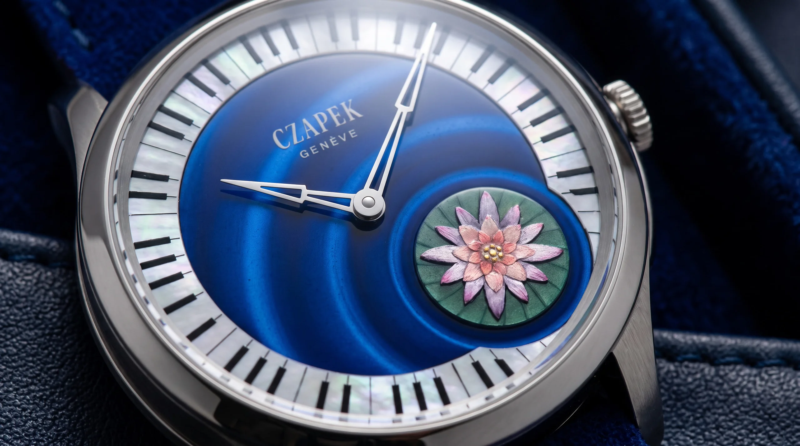 Macro detail of the Czapek Promenade L'Ecume des Jours dial showing the enamel finish and mother-of-pearl piano-key flange