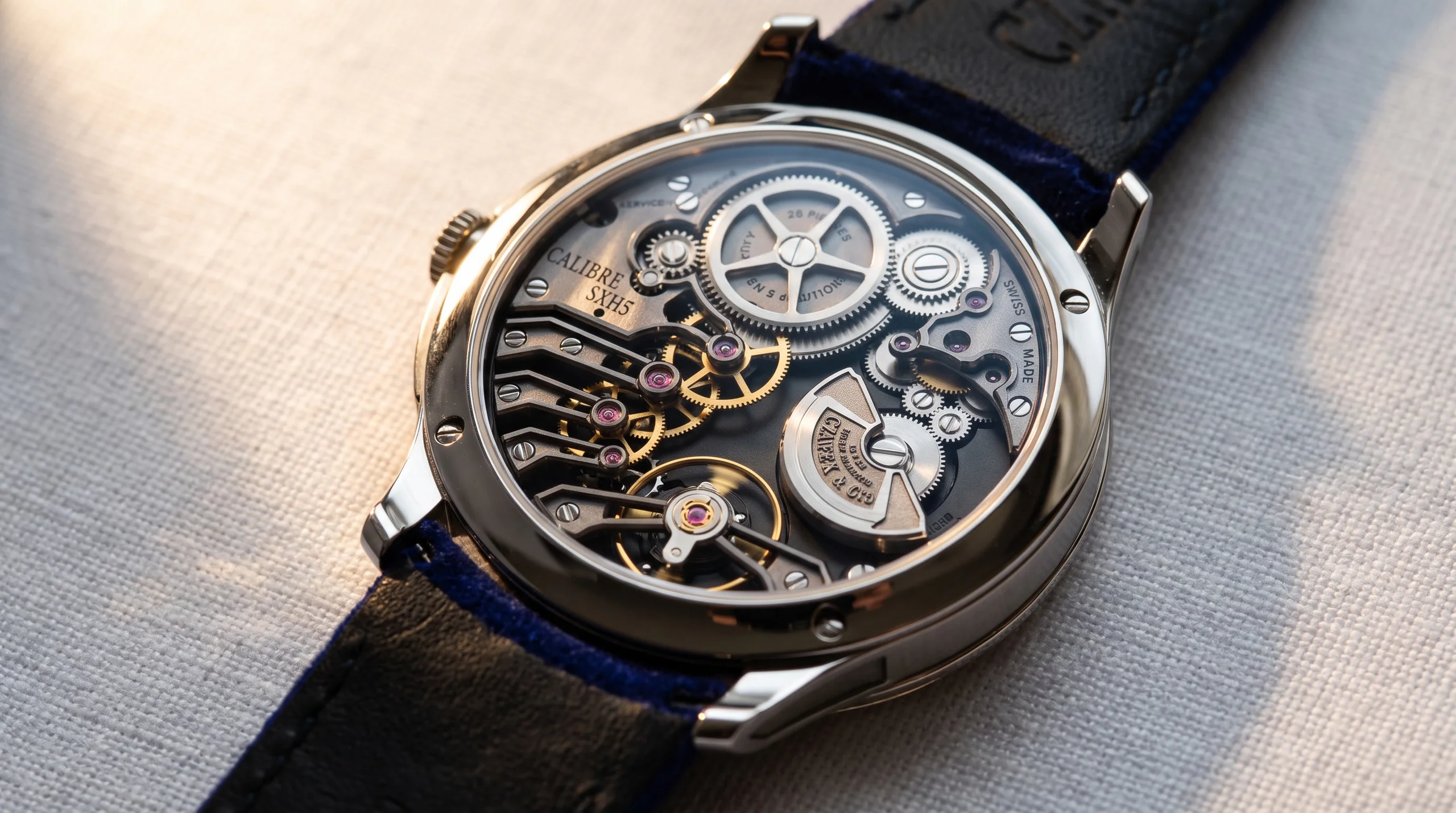 Open caseback view of the Czapek Promenade L'Ecume des Jours showing the in-house Caliber SXH5.1 movement with platinum micro-rotor