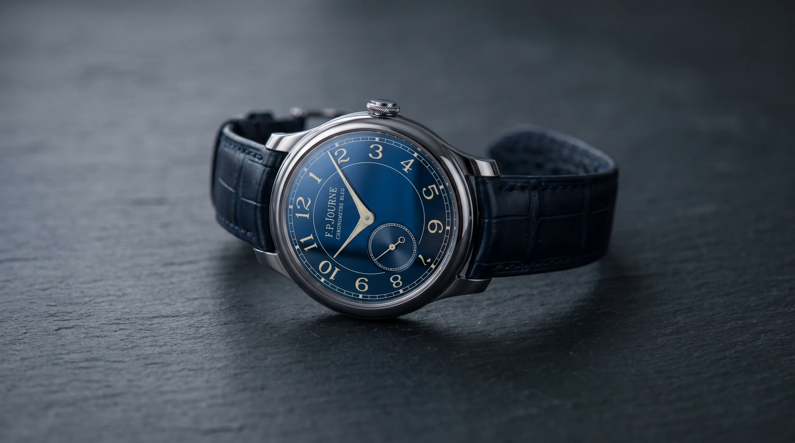 F.P. Journe Chronometre Bleu with a chrome blue dial and tantalum case on dark slate