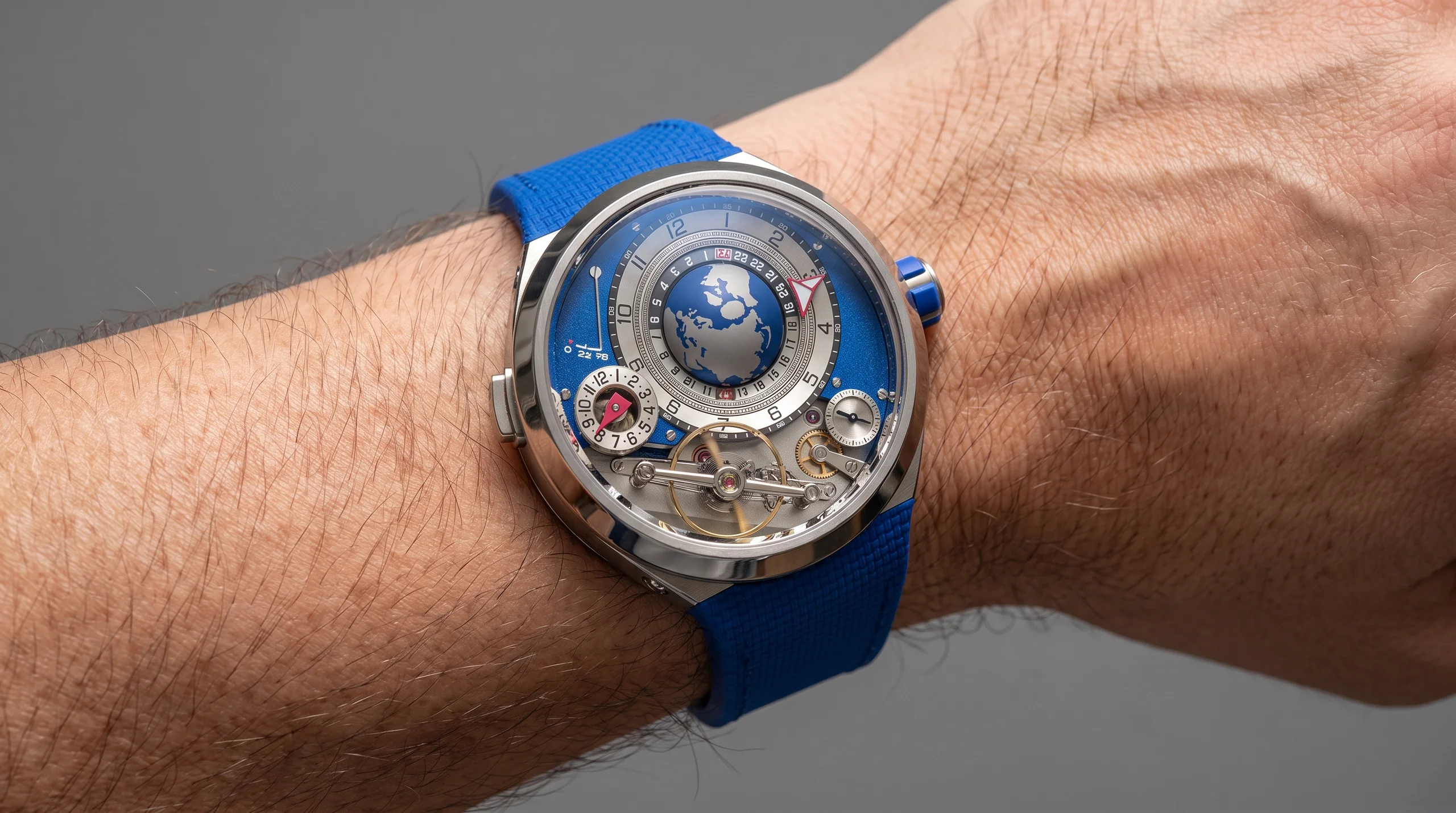 Greubel Forsey GMT Balancier Convexe titanium watch worn on wrist, front angle