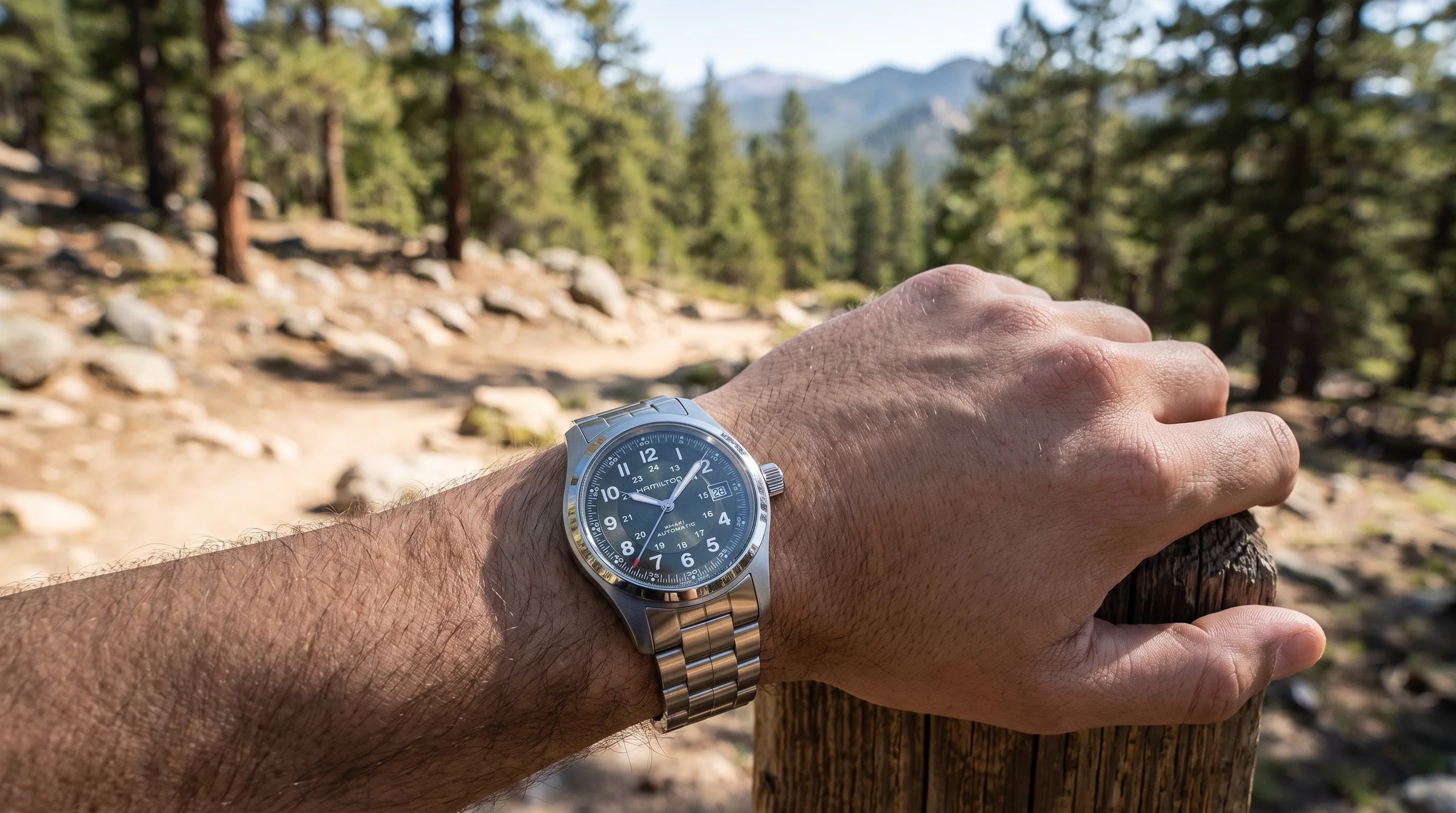 Hamilton Khaki Field Automatic worn on the wrist outdoors, a rugged Swiss field watch under $1,000
