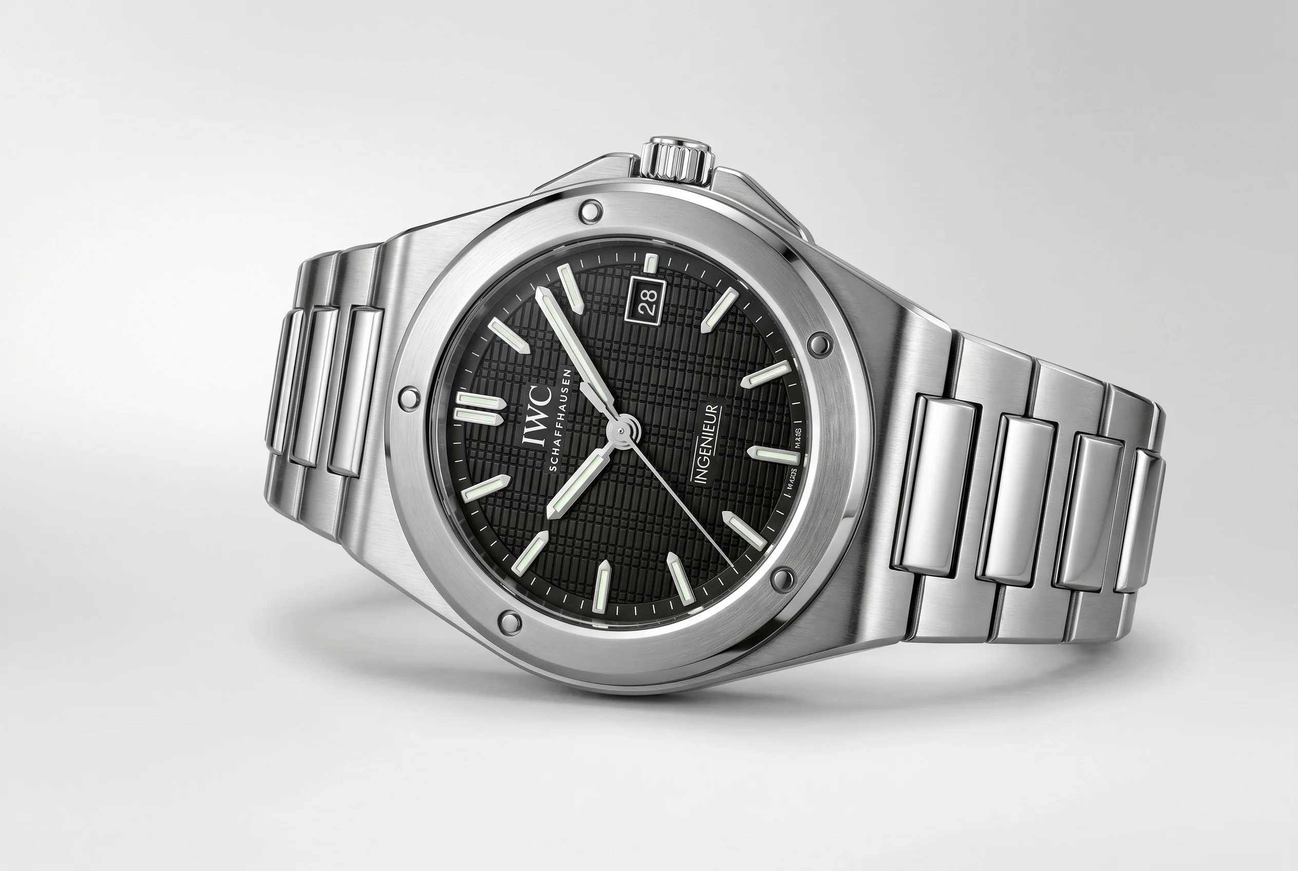 IWC Ingenieur Automatic 40 IW328901 in stainless steel with black grid dial five-screw bezel and integrated H-link bracelet