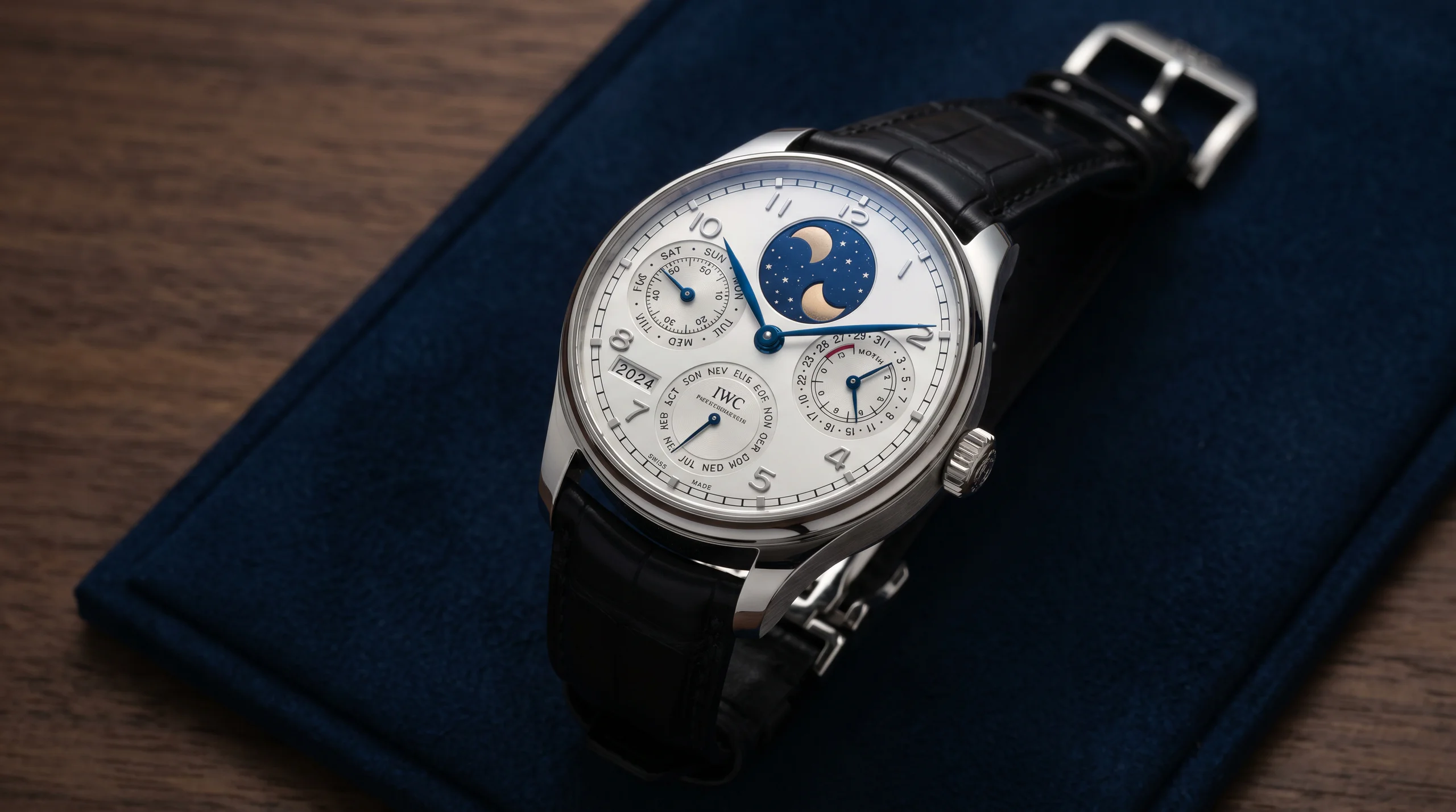 IWC Portugieser Eternal Calendar reference IW505701 in platinum with silver dial, double moon phase at 6, four-digit year window, secular perpetual calendar layout