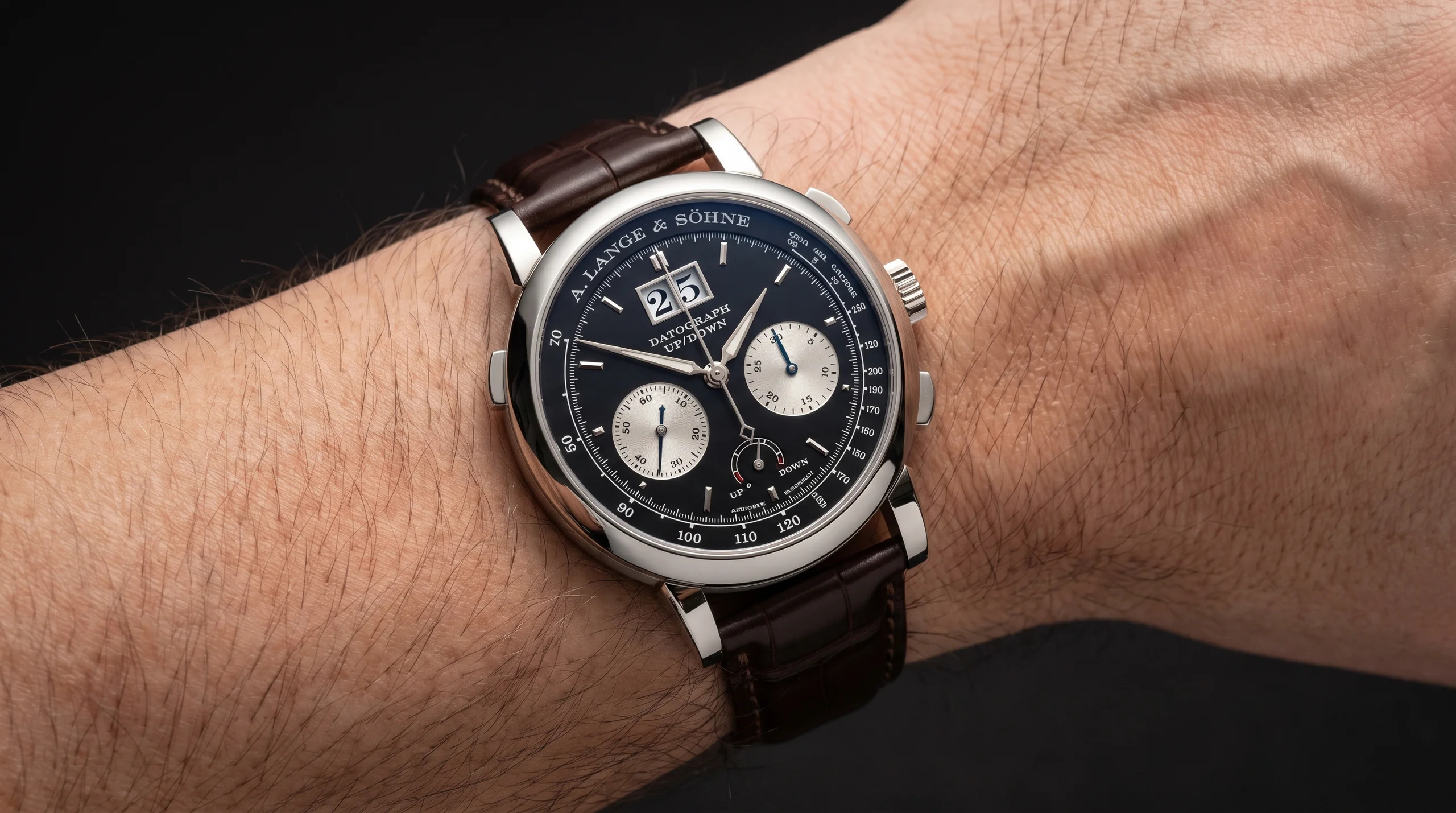 A. Lange & Sohne Datograph Up/Down platinum watch worn on wrist, front angle