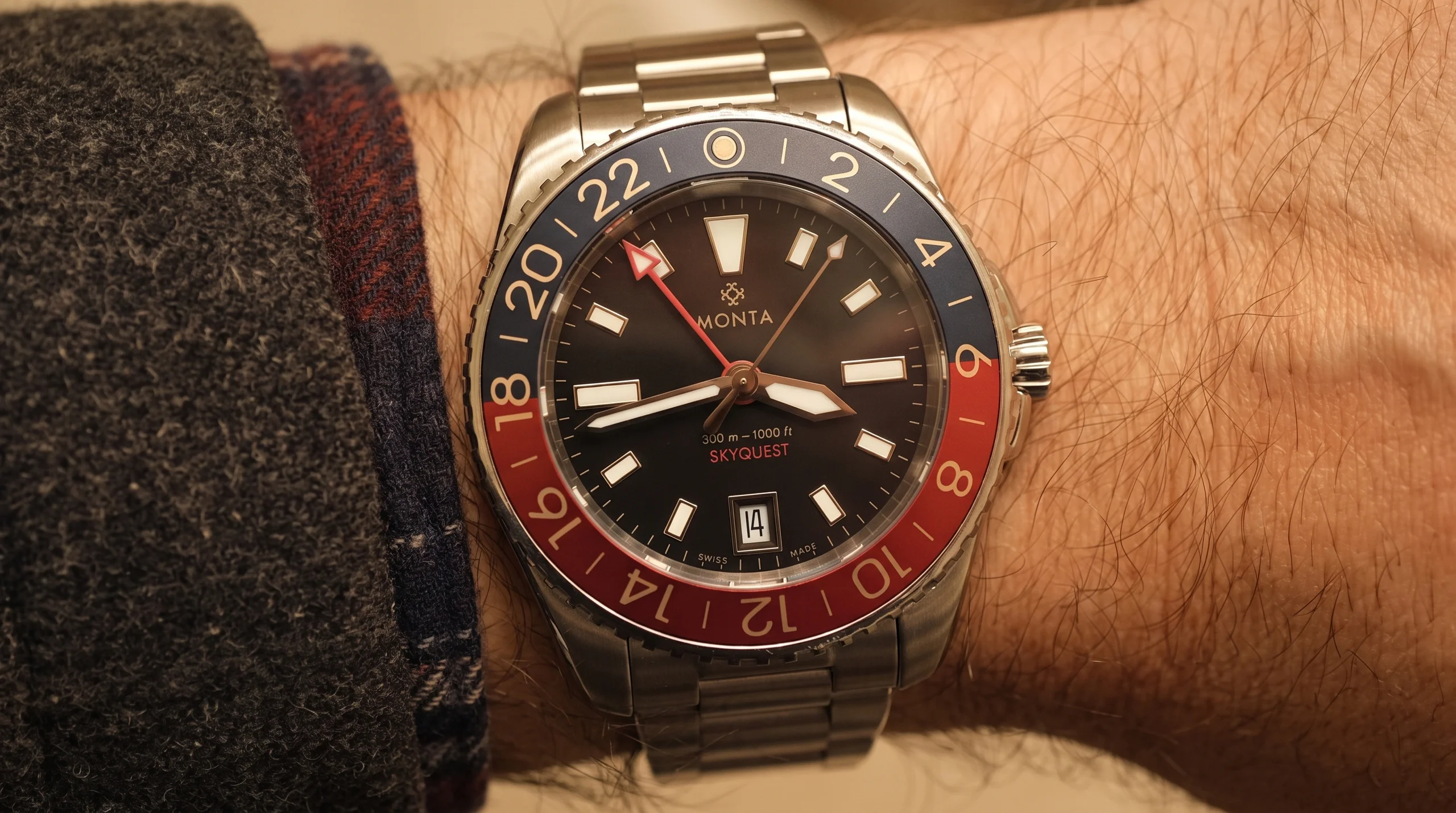 Monta Skyquest GMT watch on a steel bracelet worn on the wrist for scale