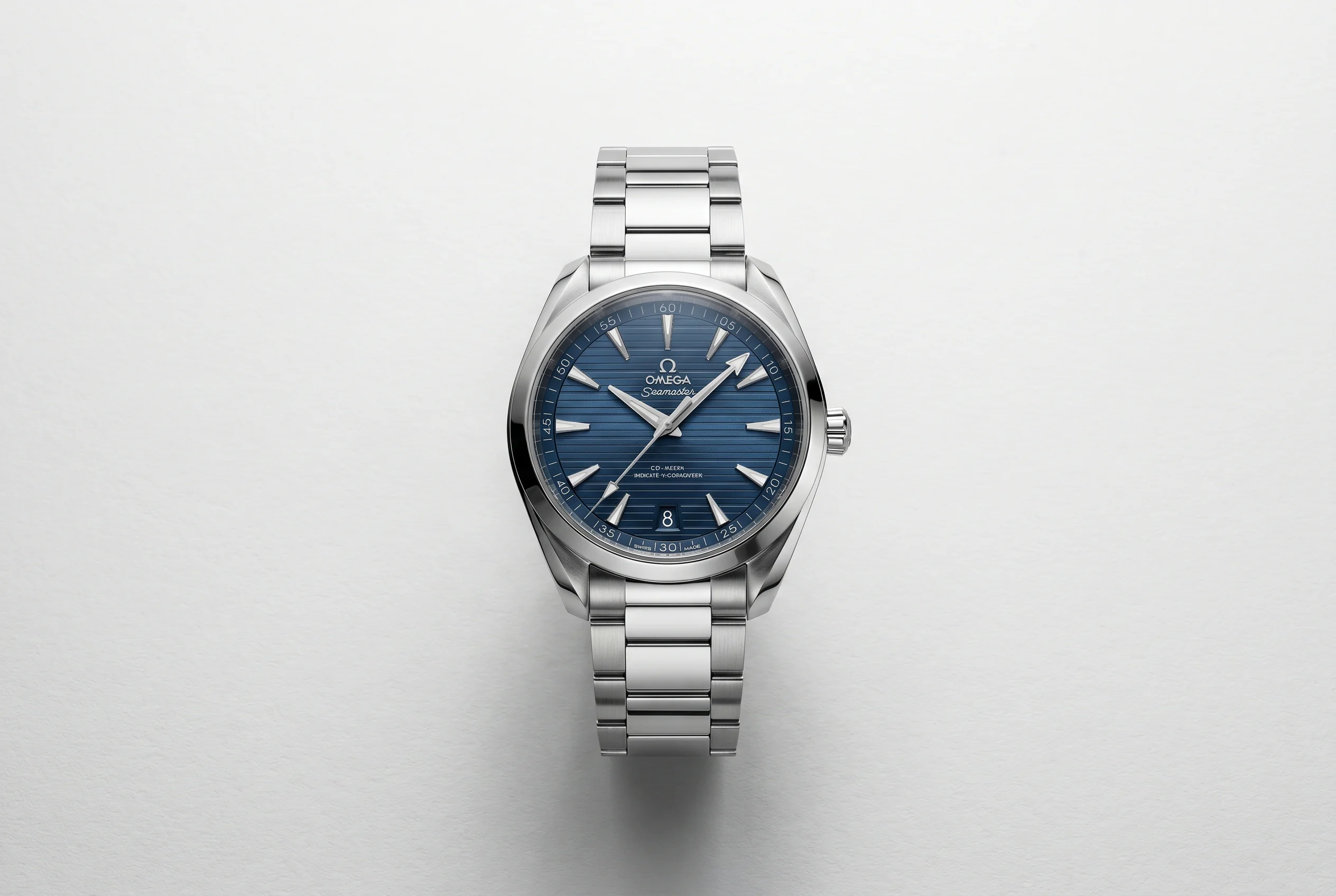 Omega Seamaster Aqua Terra 41mm in stainless steel with deep blue horizontal teak pattern dial and arrow-tipped hands