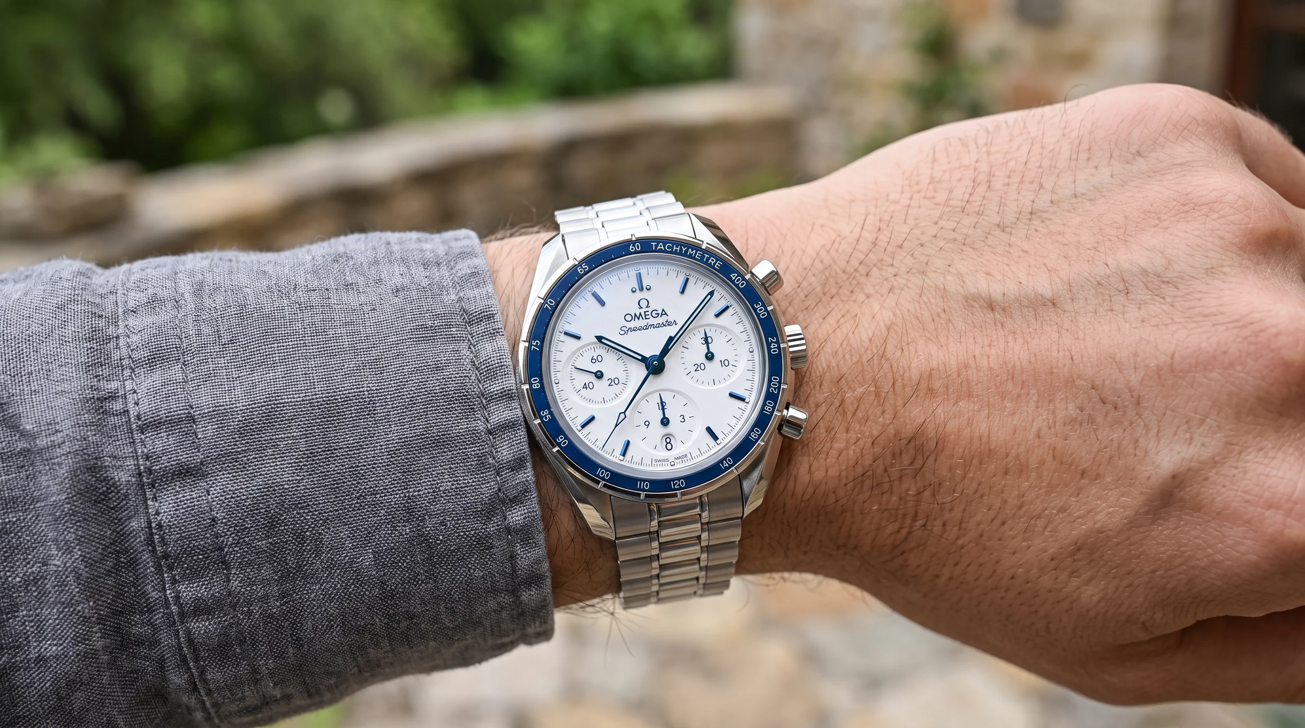 Omega Speedmaster 38mm 2026 blue ceramic bezel reference worn on the wrist