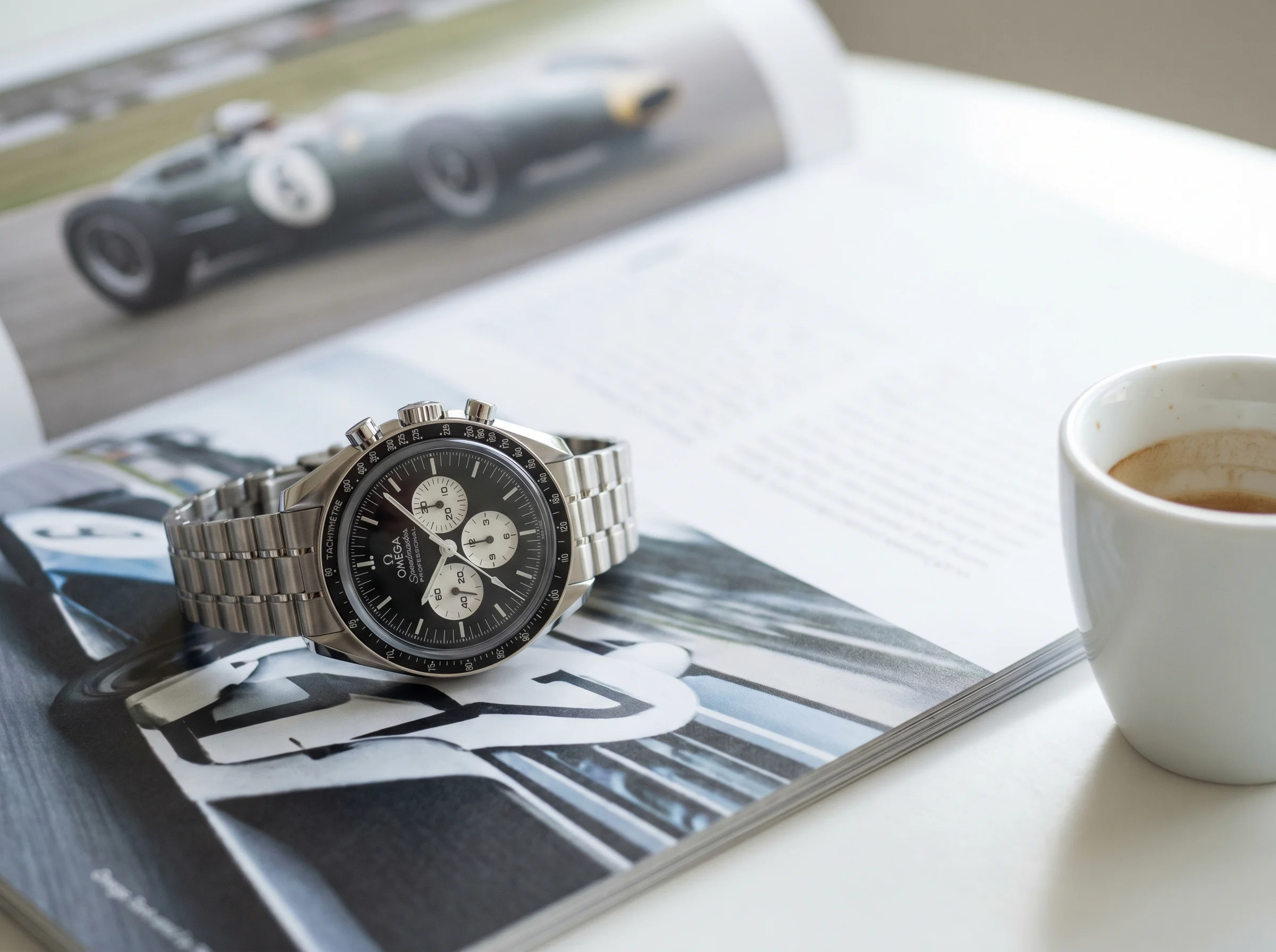 Omega Speedmaster Moonwatch Reverse Panda 310.30.42.50.01.004 with glossy black lacquered dial, white sub-dials, black ceramic bezel with enamel-filled tachymeter