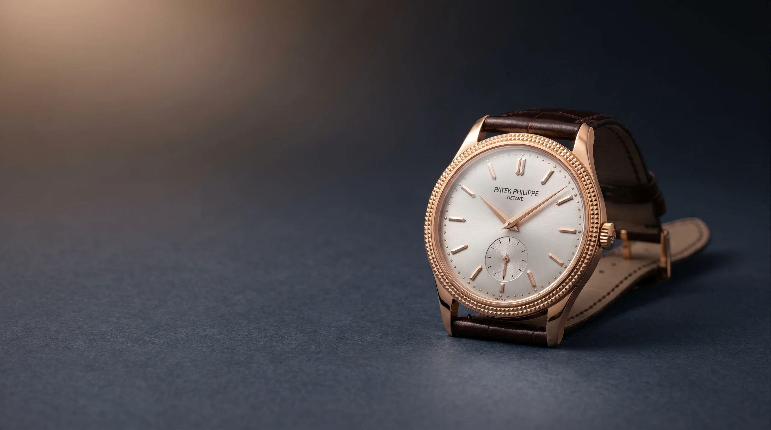 Patek Philippe Calatrava 6119R in 18k rose gold with silver opaline dial and hobnail Clous de Paris bezel