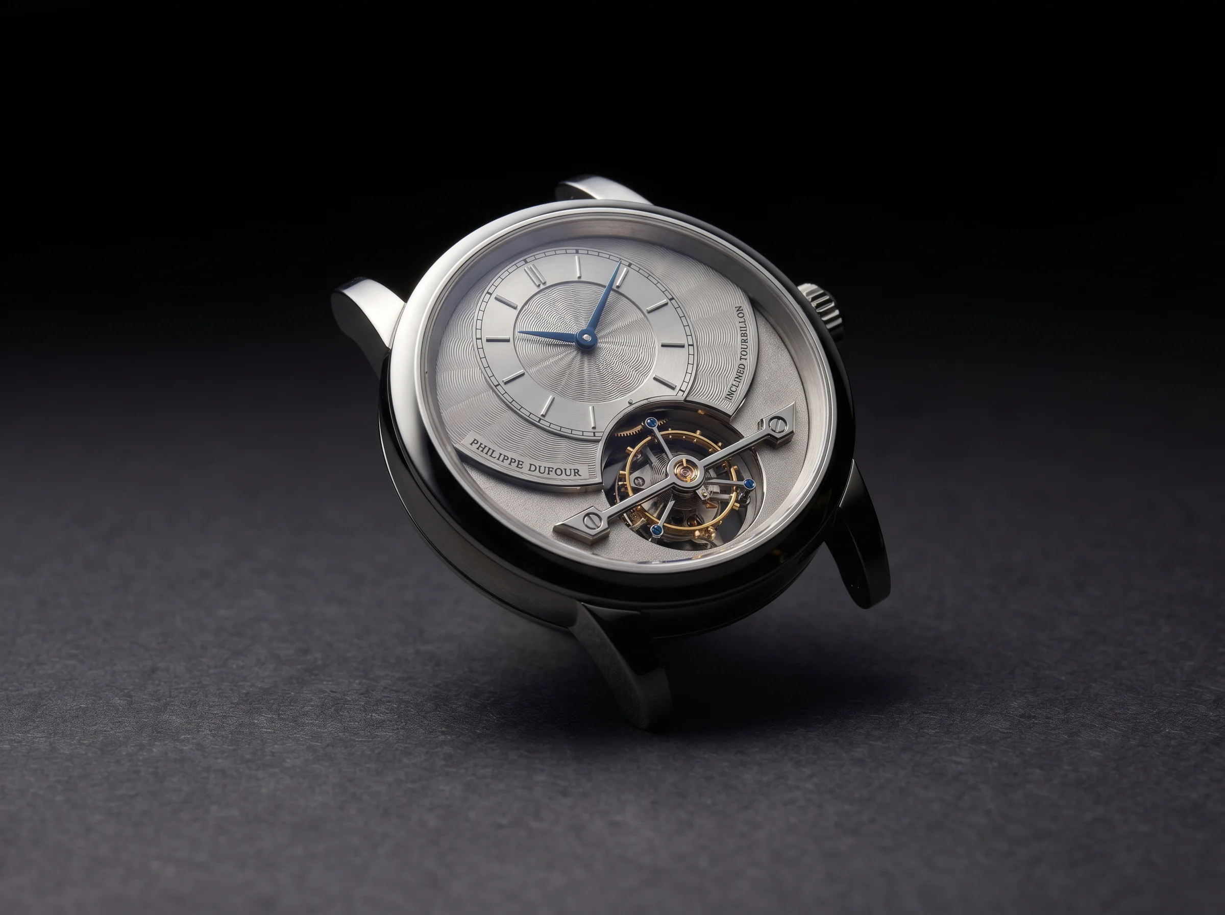 Modern haute horlogerie tourbillon wristwatch in polished platinum case with inclined tourbillon cage and frosted bridges