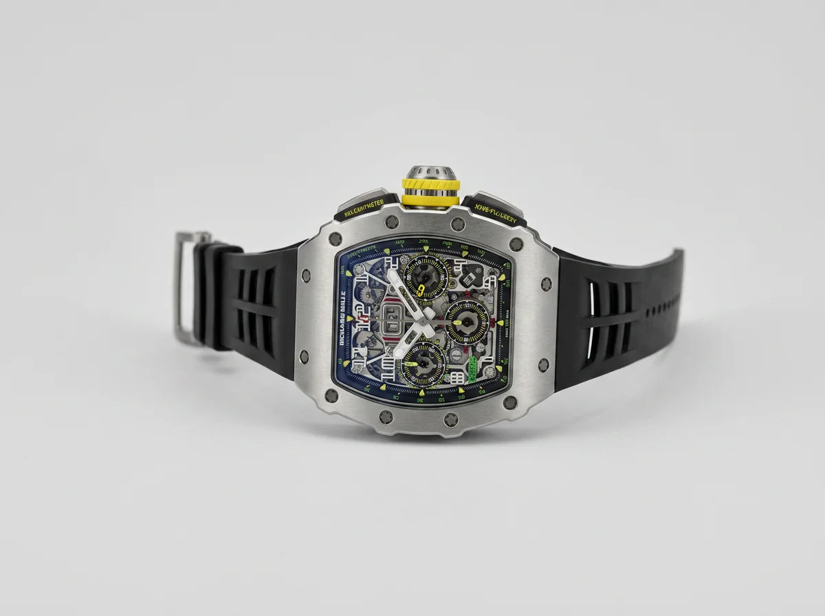 Richard Mille RM 11-03 in titanium, three-quarter studio view showing the tonneau case and spline screws