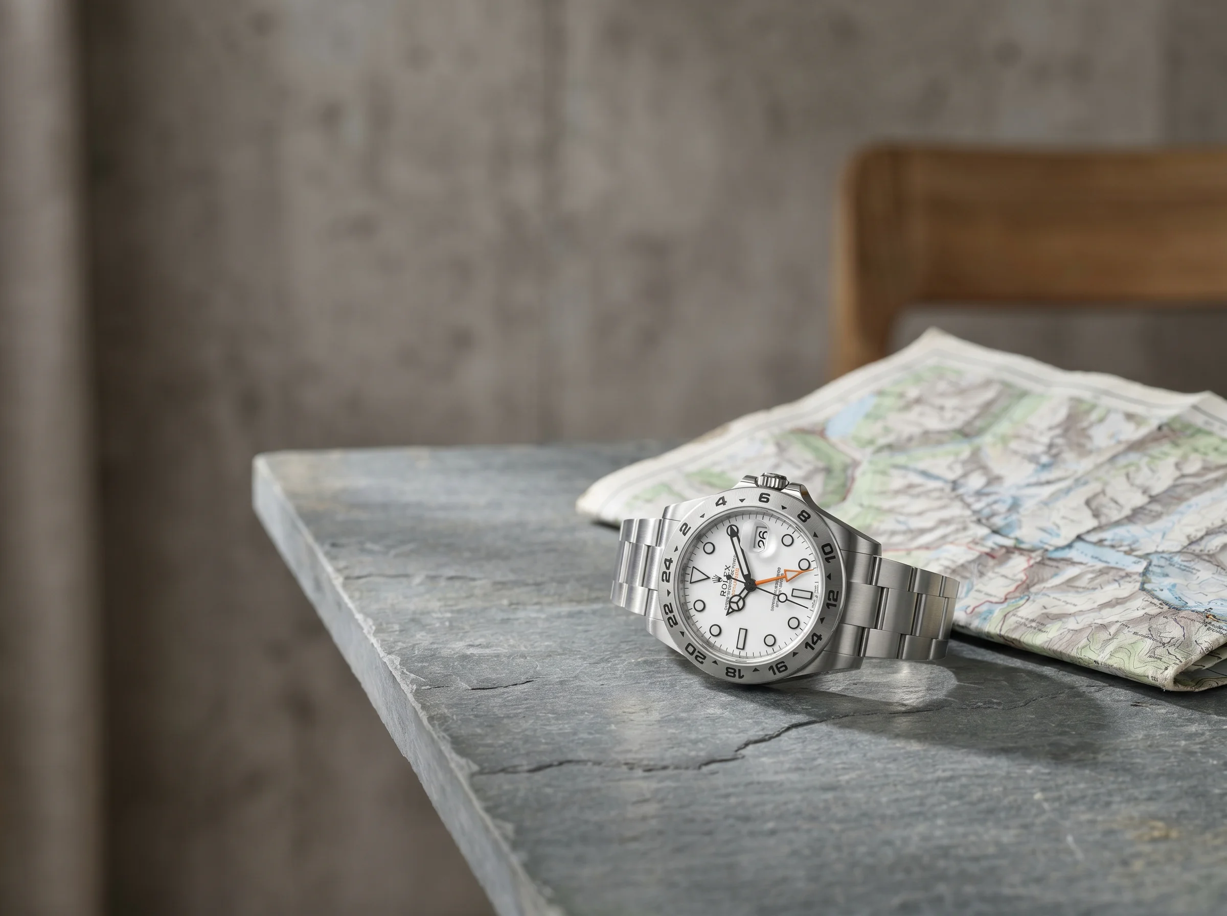 Rolex Explorer II 226570 Polar three-quarter view showing the fixed 24-hour bezel and orange hand