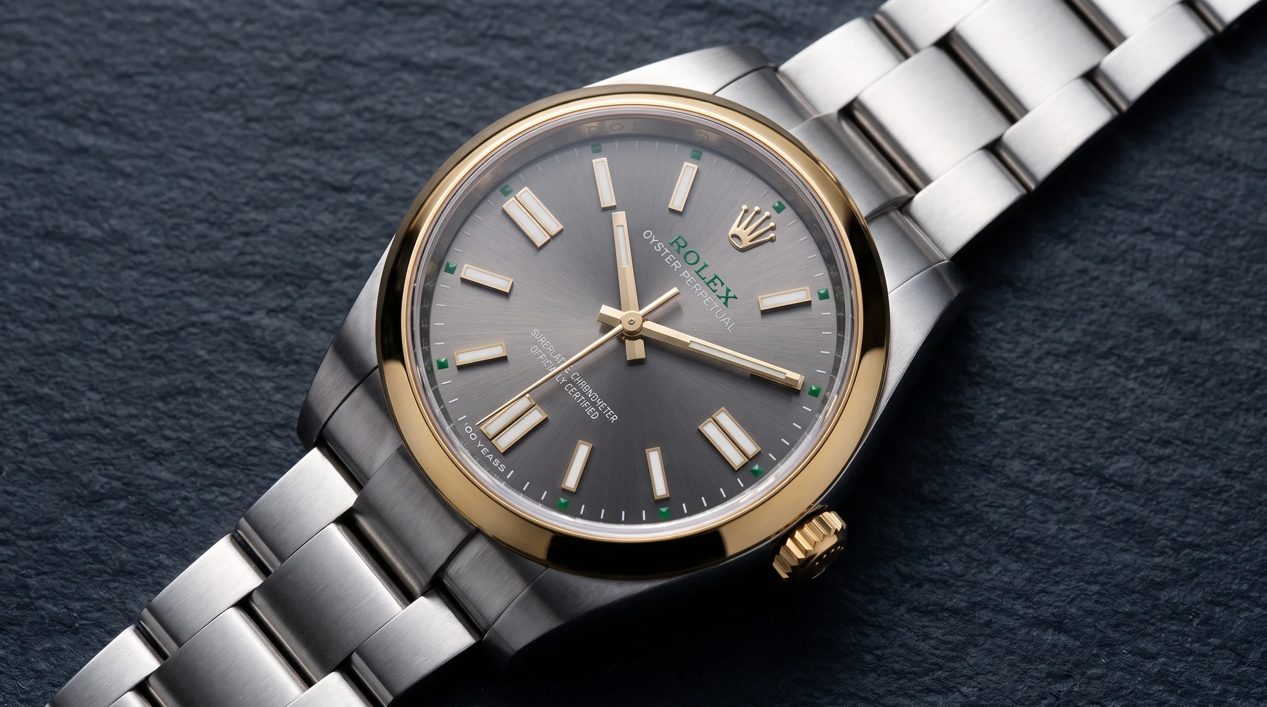 Rolex Oyster Perpetual 41 100 Years anniversary in yellow Rolesor with slate dial and green accents