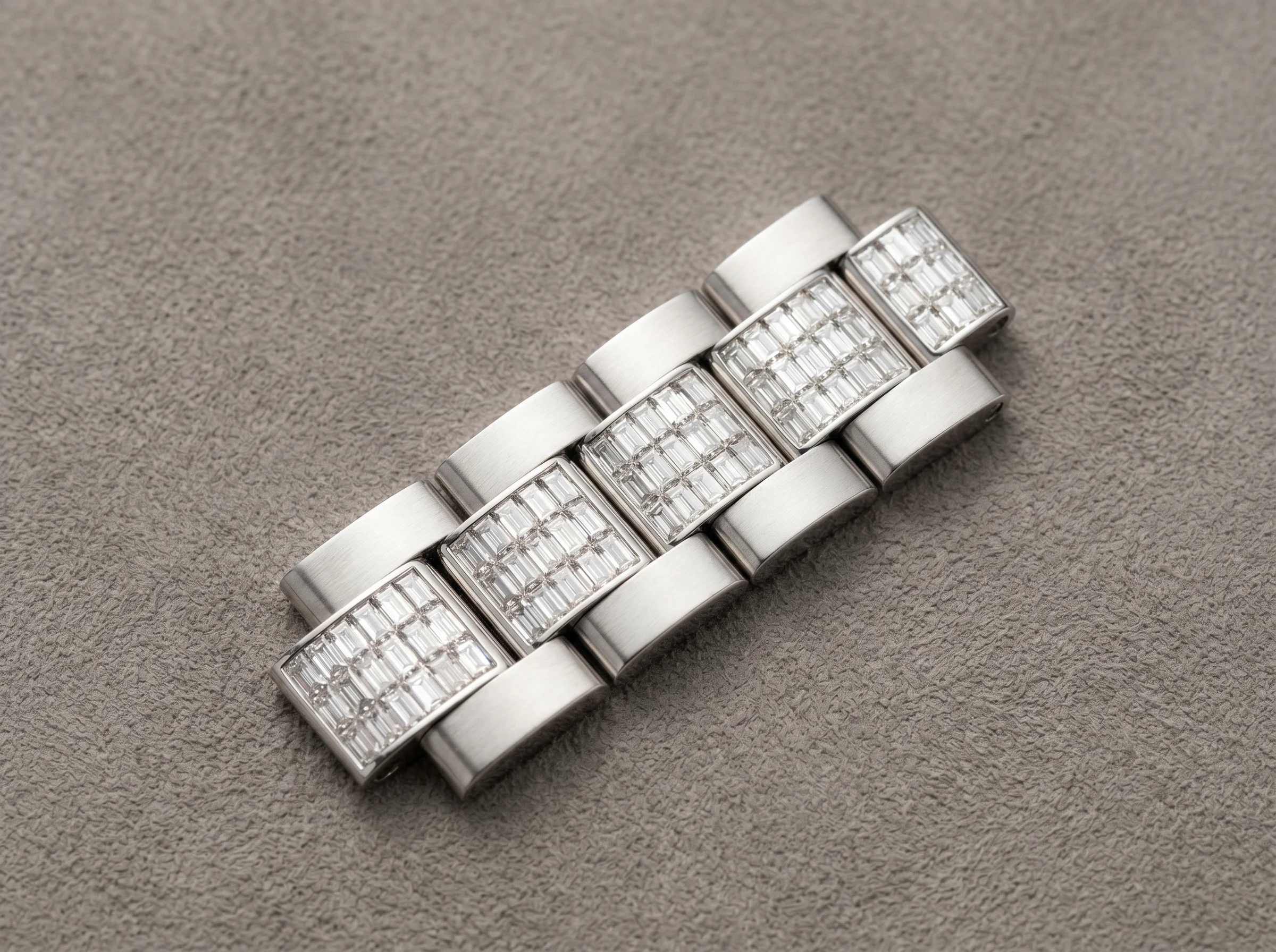 Detail of 18k white gold luxury watch bracelet with baguette diamond setting