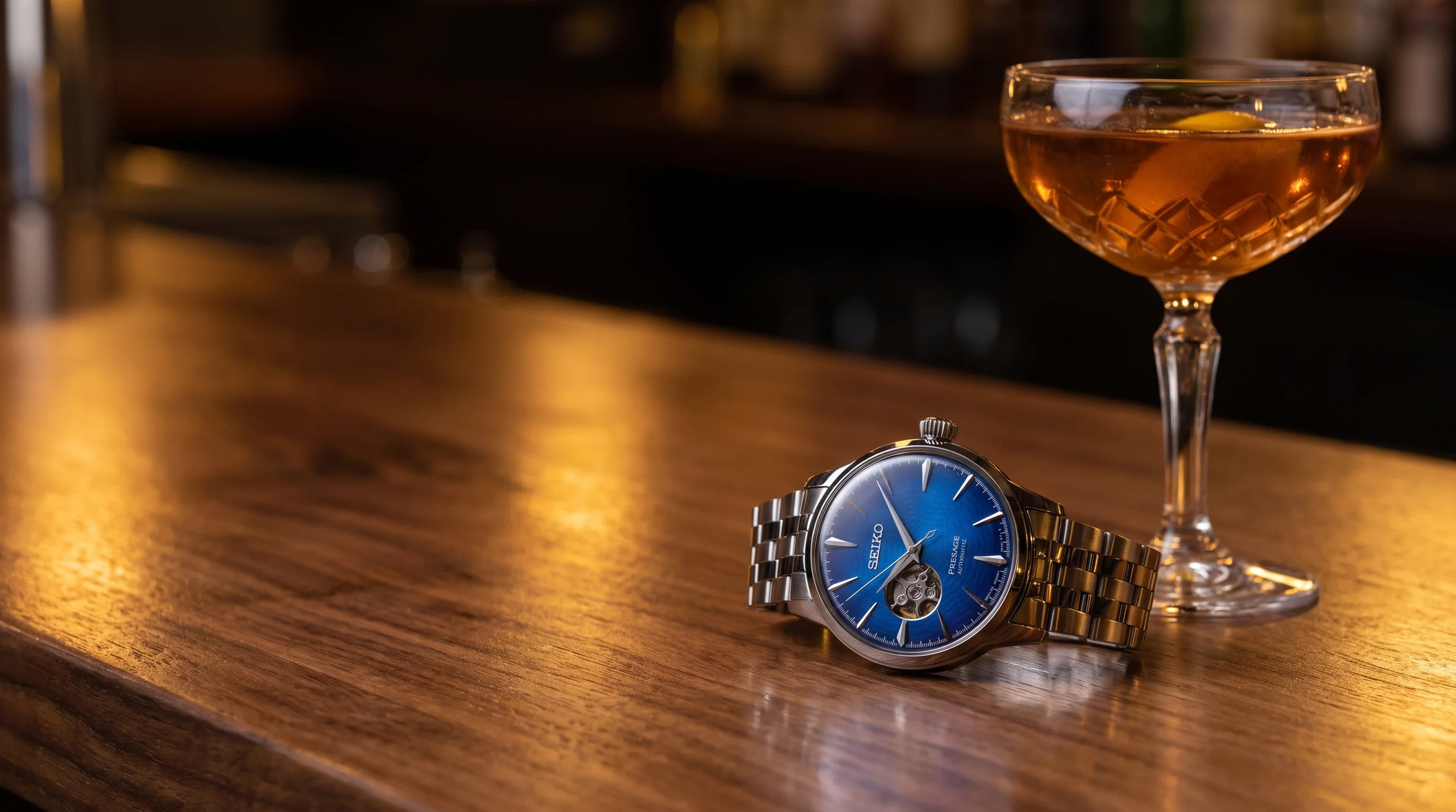 Seiko Presage Cocktail Time blue dial on a walnut bar top