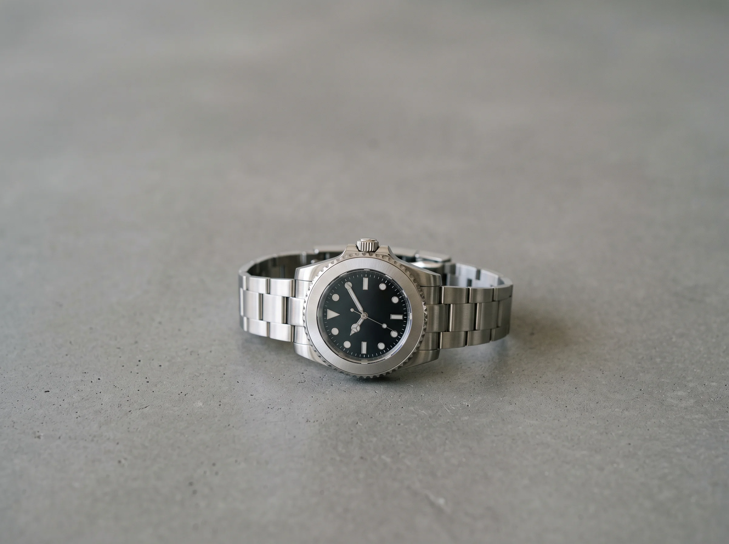 A steel sports watch, representing the hyped steel references that still trade above retail