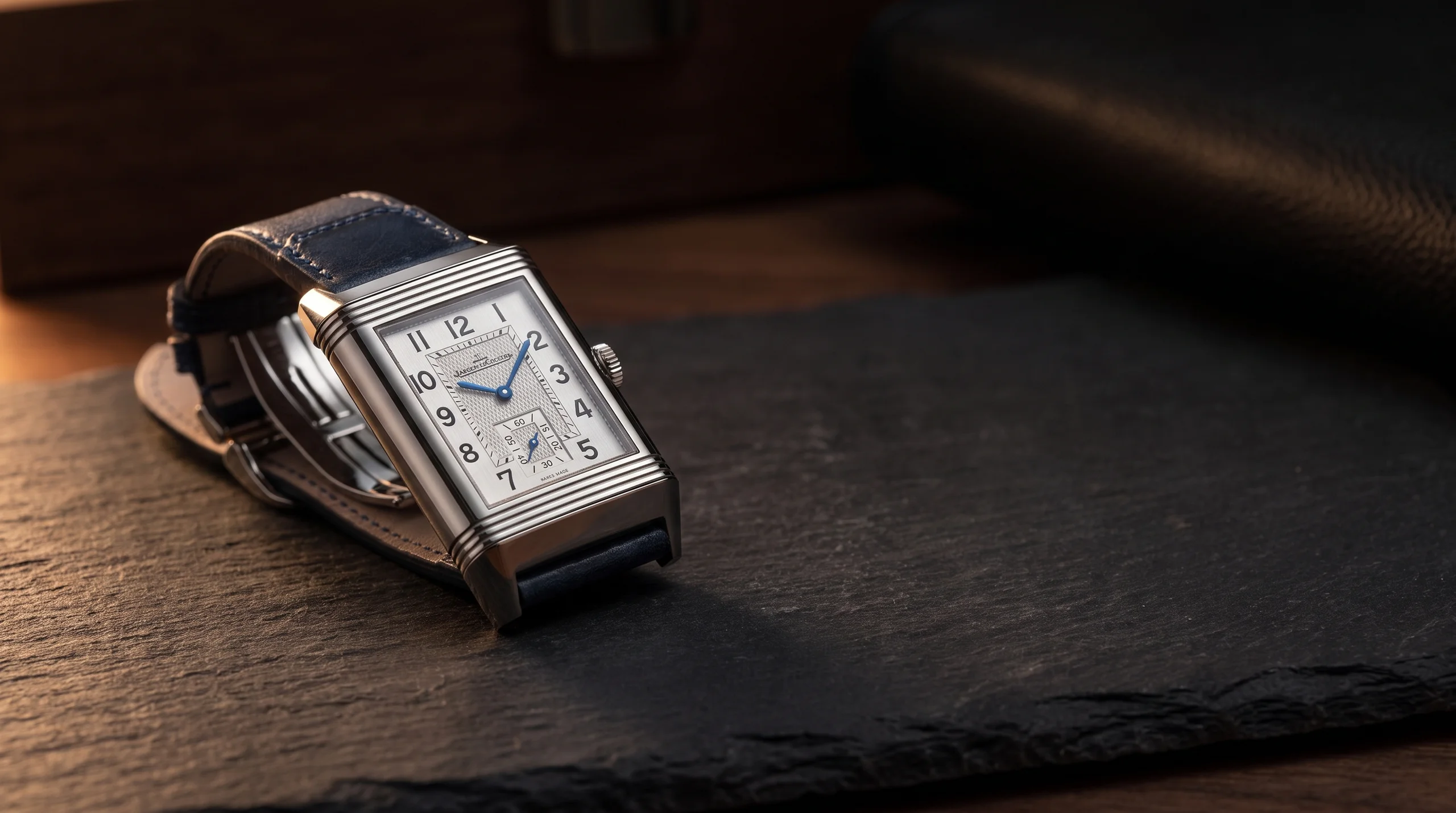 Jaeger-LeCoultre Reverso Duoface flipped in its cradle showing the second dial, the reversible case that defines the Reverso