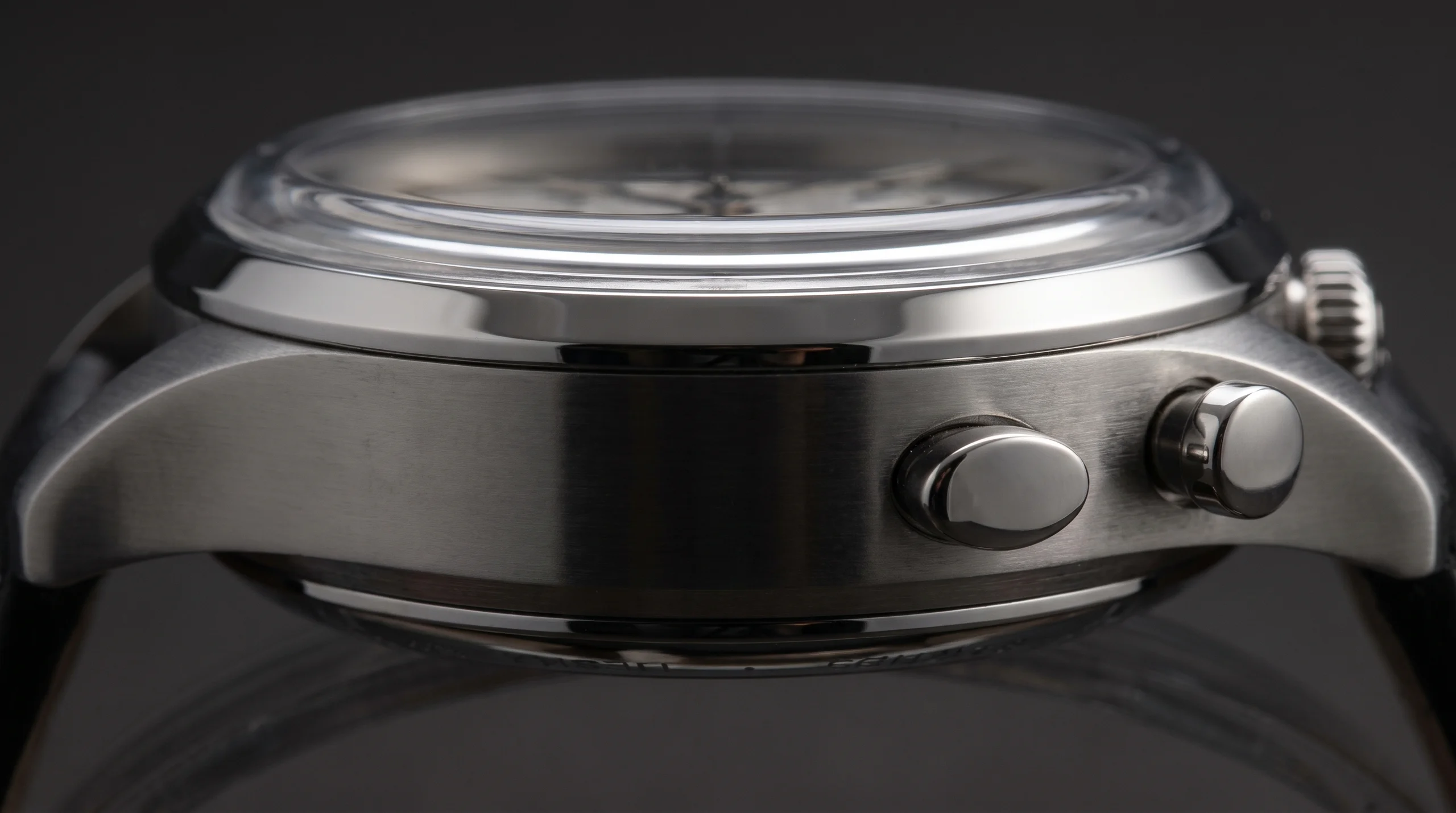 Tissot Telemeter 1938 Chronograph case side profile showing the almond-shaped chronograph pushers