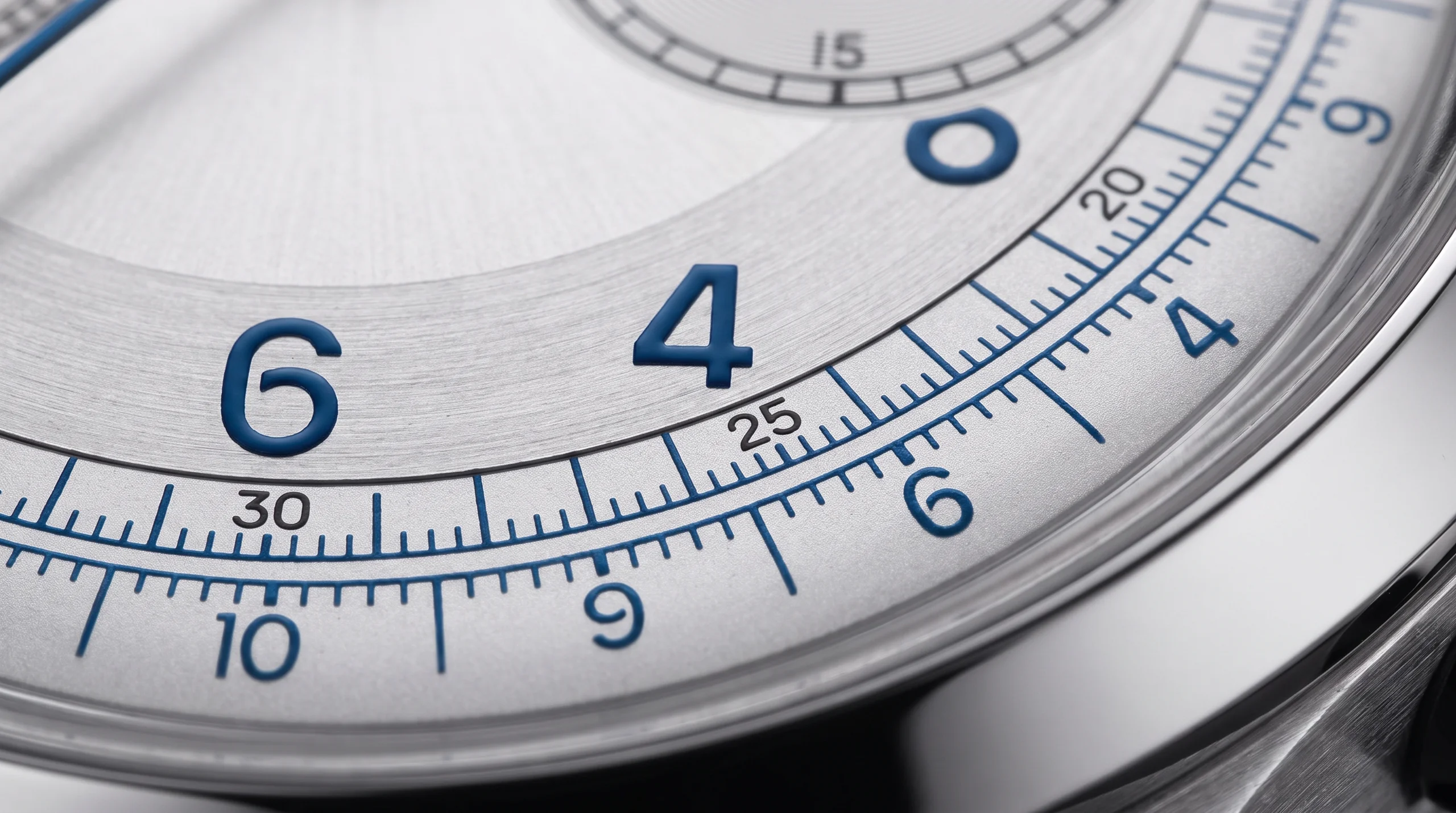 Extreme macro of the Tissot Telemeter 1938 dial showing the blue telemeter scale graduated in kilometers