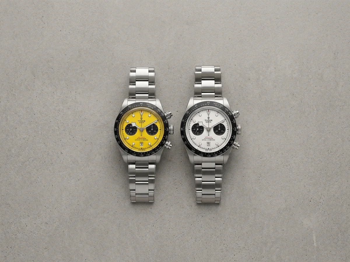 Tudor Black Bay Chrono 39mm Bumblebee beside 41mm Black Bay Chrono showing size comparison on grey surface