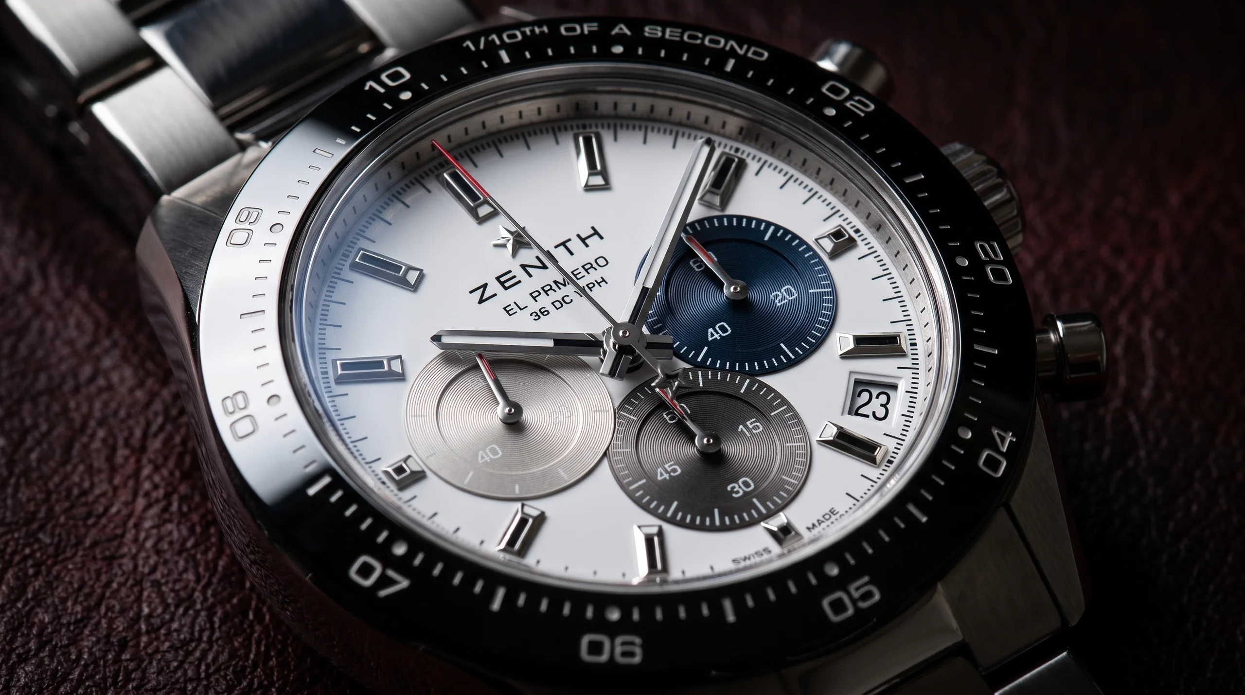 Macro of the Zenith Chronomaster Sport 1/10th second bezel and tri-color subdials
